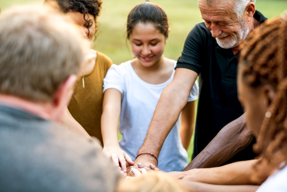 Person with disability participating in a community event with support staff – Australian Disability Services